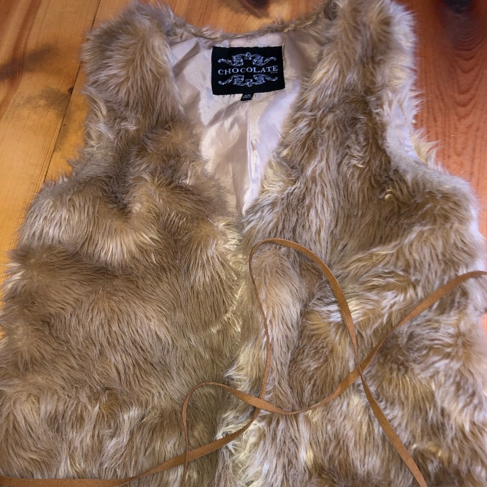 Light brown fur vest with belt
